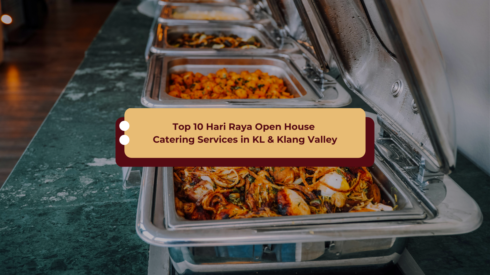 Buffet line with hot dishes served in stainless steel chafing trays